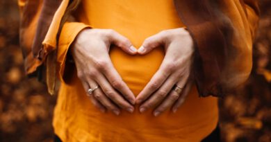 person touching stomach